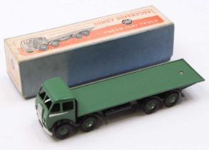 Dinky Toys No. 502 Foden flat truck comprising 1st type cab with a green body, back and hubs, with