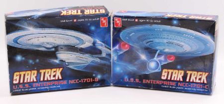 2 AMT Star Trek U.S.S. Enterprise model kits comprising a 1/1400th scale model NCC-1701-C, and a 1/