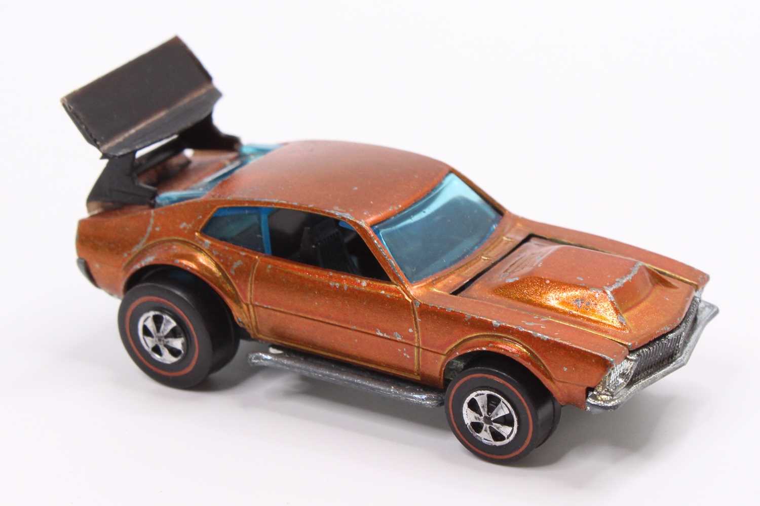 A Hot Wheels Redlines 'Mighty Maverick' in copper with a black interior & spoiler (VG) - Image 4 of 5