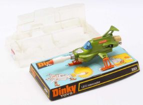 A Dinky Toys No. 351 UFO Interceptor, comprising metallic green body with orange plastic feet and
