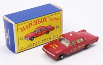 Matchbox Lesney No. 59 Ford Fairlane Fire Chiefs Car in red with black plastic wheels and 'Fire