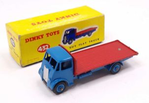 Dinky Toys No. 432 Guy flat truck comprising of rare bright blue cab and chassis with red back and