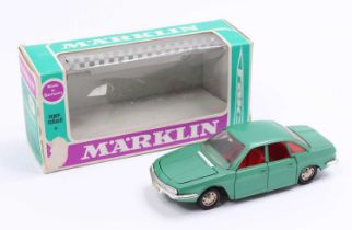 A Marklin No. 1811 NSU RO 80 comprising a metallic green body, with a red interior, sold in the