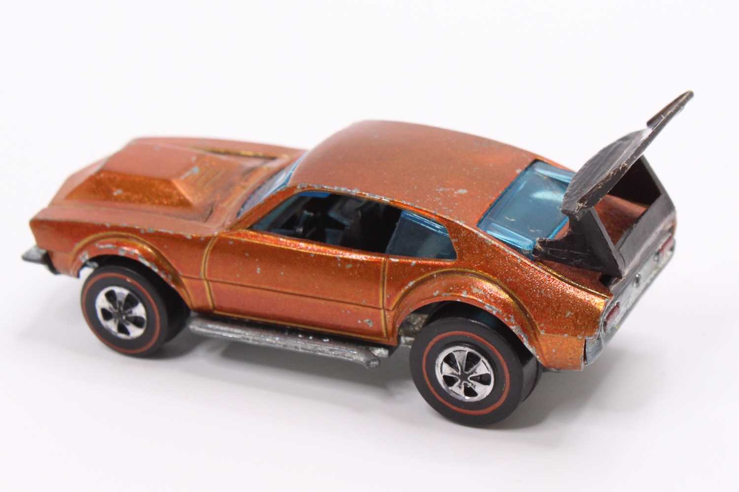 A Hot Wheels Redlines 'Mighty Maverick' in copper with a black interior & spoiler (VG) - Image 3 of 5