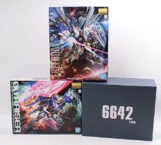 Bandai Master Grade Gundam Plastic Kit Group, 3 examples to include Daban Phenex 6642, 00 Raiser