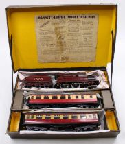 Bassett-Lowke clockwork passenger train set. 4-4-0 loco, maroon, MR crest on cab-sides, embossed