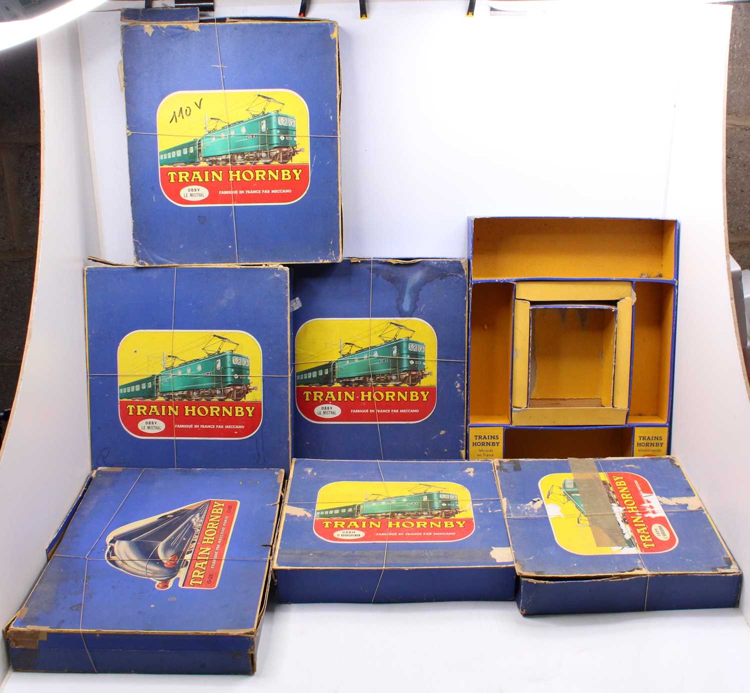 French Hornby empty set boxes. All in need of some restoration but generally the bases are in better