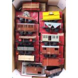 Thirteen Hornby 4-wheel post-war goods wagons, all but one boxed, in one large tray. Some