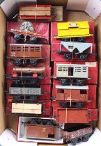 Thirteen Hornby 4-wheel post-war goods wagons, all but one boxed, in one large tray. Some