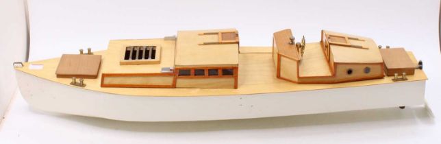 A very well made wooden and balsa wood kit built model of a cabin cruiser style launch, radio