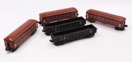 Three 0-gauge Lionel bogie coaches, brown with grey window frames: two x 2442 ‘Pullman’ & one