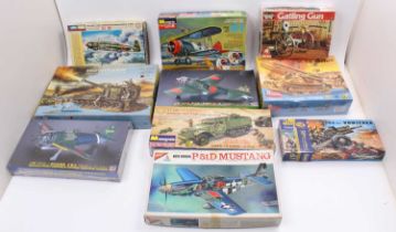 10 various mixed scale military model kits, with examples including a Hasegawa Mitsubishi A6M5