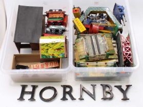 Two plastic trays containing mainly Hornby items: 1930-3 No.2 clockwork level crossing (G-VG); pre-