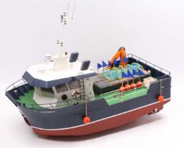 A very well made GRP hull and balsawood kit built model of a Lonabrak Cargo Ship, finished in red,