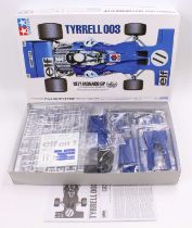 A Tamiya No. 12054 1/12 scale plastic kit for a Tyrrell 003 1971 Monaco Grand Prix F1 race car, as