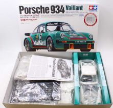 A Tamiya No. 12056 1/12 scale Big Scale Car Series plastic kit for a Porsche 934 Vaillant 1976