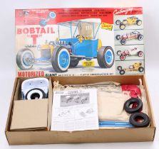 A Lindberg No. 690M 1498 plastic motorised kit for a Bobtail "T" racing car, as issued in the