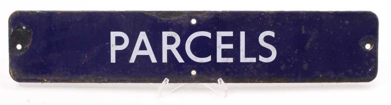 An original British Rail Eastern Region blue enamel sign 'Parcels', some chipping to one of the four