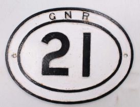 A GNR cast iron bridge plate no. 21 that has been repainted. measures 17 and 1/2 inches by 13