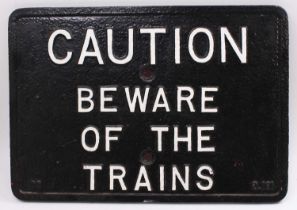 A large caution BR "Beware of the Trains" cast iron repainted sign measuring 20 inches by 14. has