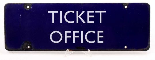 A BR Eastern Region original blue enamel sign "Ticket Office" with four fixing holes. damage