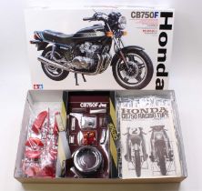 A Tamiya No. 16020 1/6 scale plastic kit for a Honda CB750F motorcycle housed in the original box,