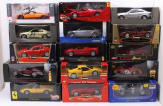 15 mixed 1/18th scale diecasts, with examples including a Hot Wheels Ferrari Dino 246GT, a Burago