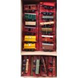 Seventeen Hornby 4-wheel post-war goods wagons, all boxed, in one large tray and one shoebox. Some