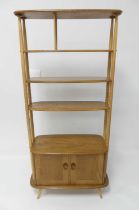 A 1960s Ercol light elm 'Giraffe' room divider, model No.363, having four open upper shelves over