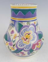 A Poole Pottery floral decorated vase, of lower squat baluster form, typically bright stylised