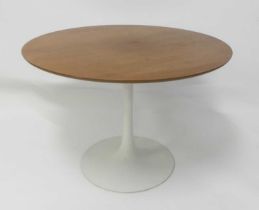 Eero Saarinen (1910-1961) for Arkana - a teak laminate circular 'Tulip' table, raised on white