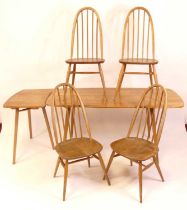 A 1960s Ercol blond elm dining suite, comprising; Windsor 382 dining table with rounded corners