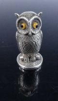 An early 20th century silver novelty pipe tamper by Sampson Morden, modelled as a perched owl with