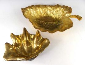 A contemporary bronze bowl, modelled as a clam shell, with polished interior, unsigned, w.32cm,