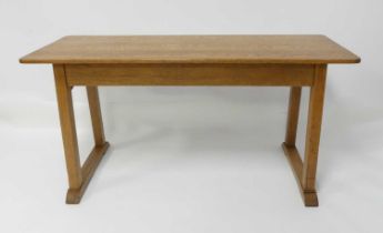 A Heal's oak 'Letchworth' dining table, circa 1905, designed by Ambrose Heal, of plain rectangular