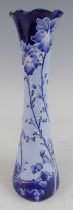 A Moorcroft MacIntyre Florian ware pottery vase, decorated with blue pansies, with wavy rim and of