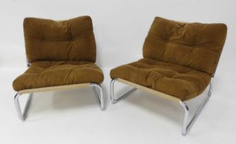 A set of four 1970s Habitat tubular chrome framed low easy chairs, each of cantilever form, with