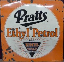 An early 20th century enamel on metal wall mounted advertising sign for 'Pratts Ethyl Petrol', by