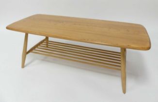 An Ercol light elm Windsor 459 low coffee table, having rounded corners, laddered undertier, and