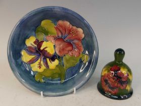A mid-20th century Moorcroft Pottery plate in the Hibiscus pattern, of dished form, typically