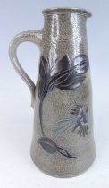 Otto Blum - a studio pottery water jug, salt-glazed stoneware, of single handled tapering form, with