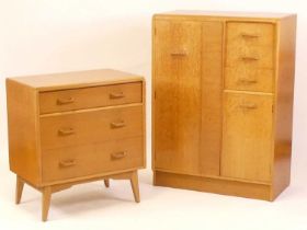 Ernest Gomme for G-Plan - a 1960s light oak two piece bedroom suite, comprising; compactum with an