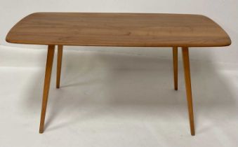 A 1960s Ercol blond elm Windsor 382 dining table, having rounded corners, on tapering square