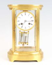 A late 19th century French gilt brass four-glass mantel clock by Gabe Vicarino & Co of Paris, having