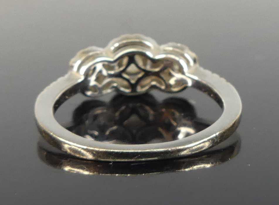 An 18ct white gold diamond triple cluster ring, featuring three graduated round brilliant cut - Image 3 of 5