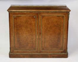 A mid-Victorian burr walnut and inlaid side cabinet, having a gilt brass arcaded raised back, the