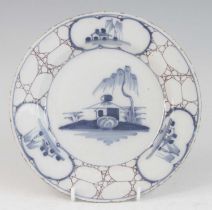 A Bristol Delftware plate, Temple Back, circa 1770-75, decorated in blue with Chinese pagodas upon a