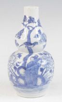 A Chinese blue and white porcelain vase, of double gourd form, underglaze decorated with birds