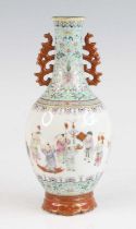 A Chinese famille rose porcelain vase, enamel decorated with children and lotus flowers,
