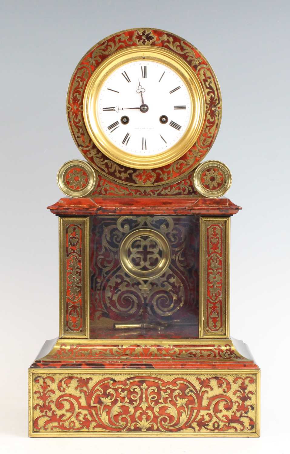 A late 19th century French boulle mantel clock, the white enamel Roman dial signed Potoniè Paris,